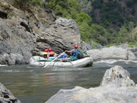 Raft Entering Stern Rapid on the Tuolumne River in California